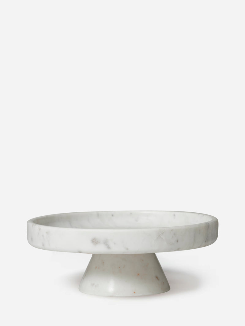 Marble cake stand on a white background