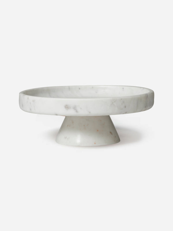Marble cake stand on a white background