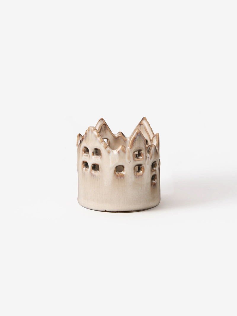 Ceramic white round house candle holder by THATCH Living with textured top on a white background