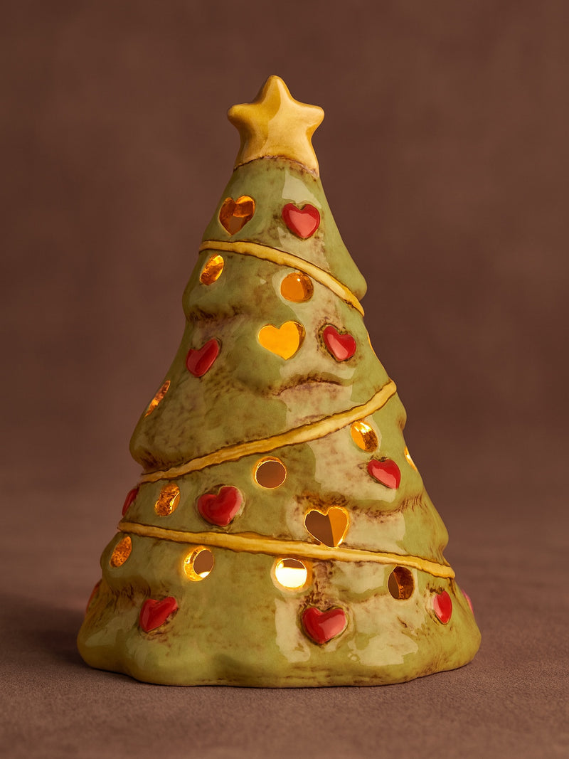 THATCH Living Ceramic Christmas tree tealight holder ornament with red hearts and a gold star on a brown background - by THATCH Living.