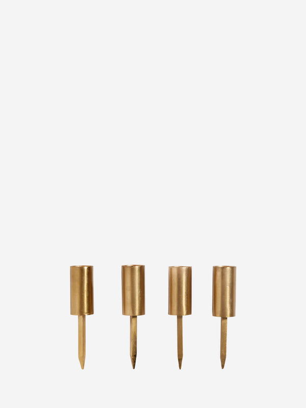 Set of 4 brushed gold candle spikes.