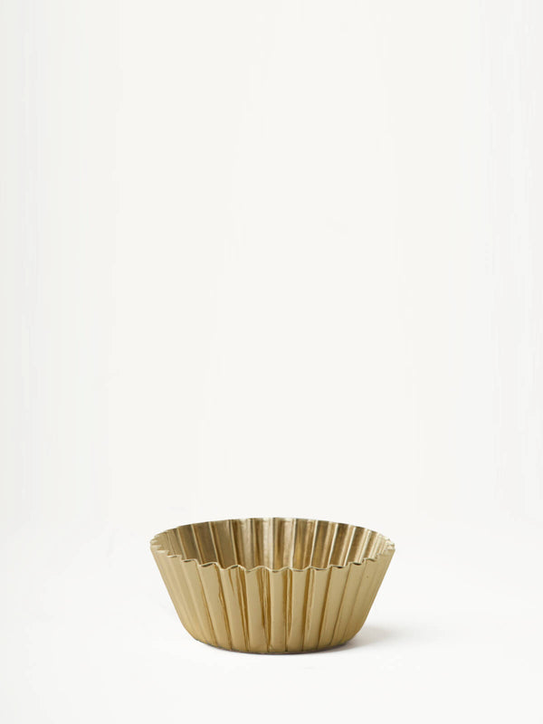 gold tealight holder in white background