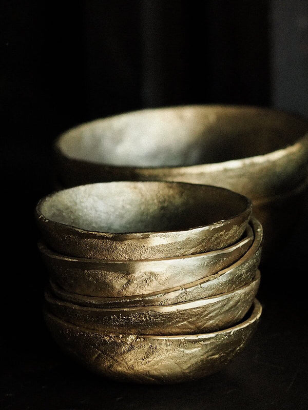 Jahi Gold Bowl Set Large in a dark background