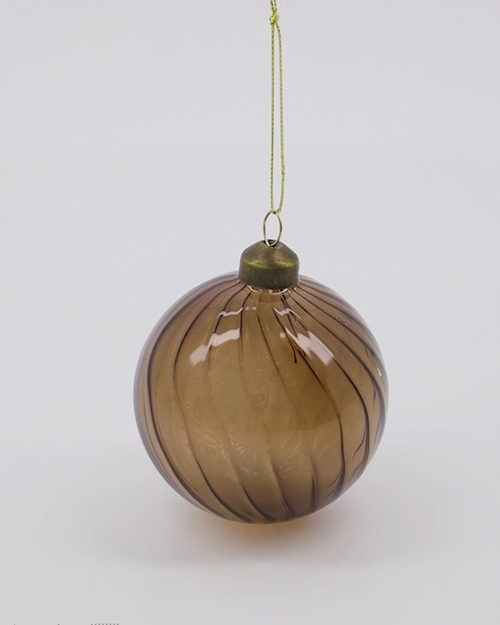 360 degree video of a brown bauble swirl design.