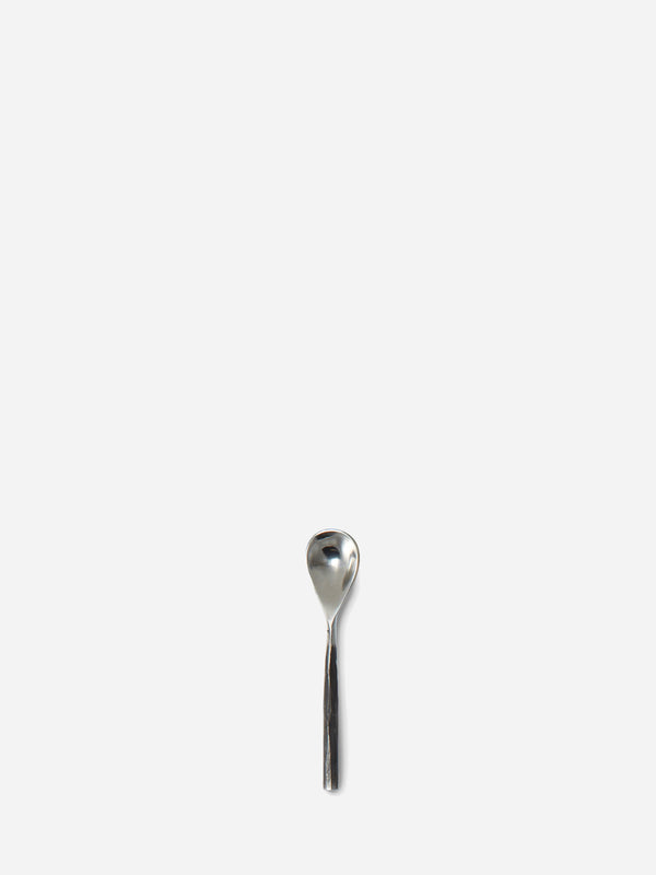 Salt spoon rustic stainless steel in white background